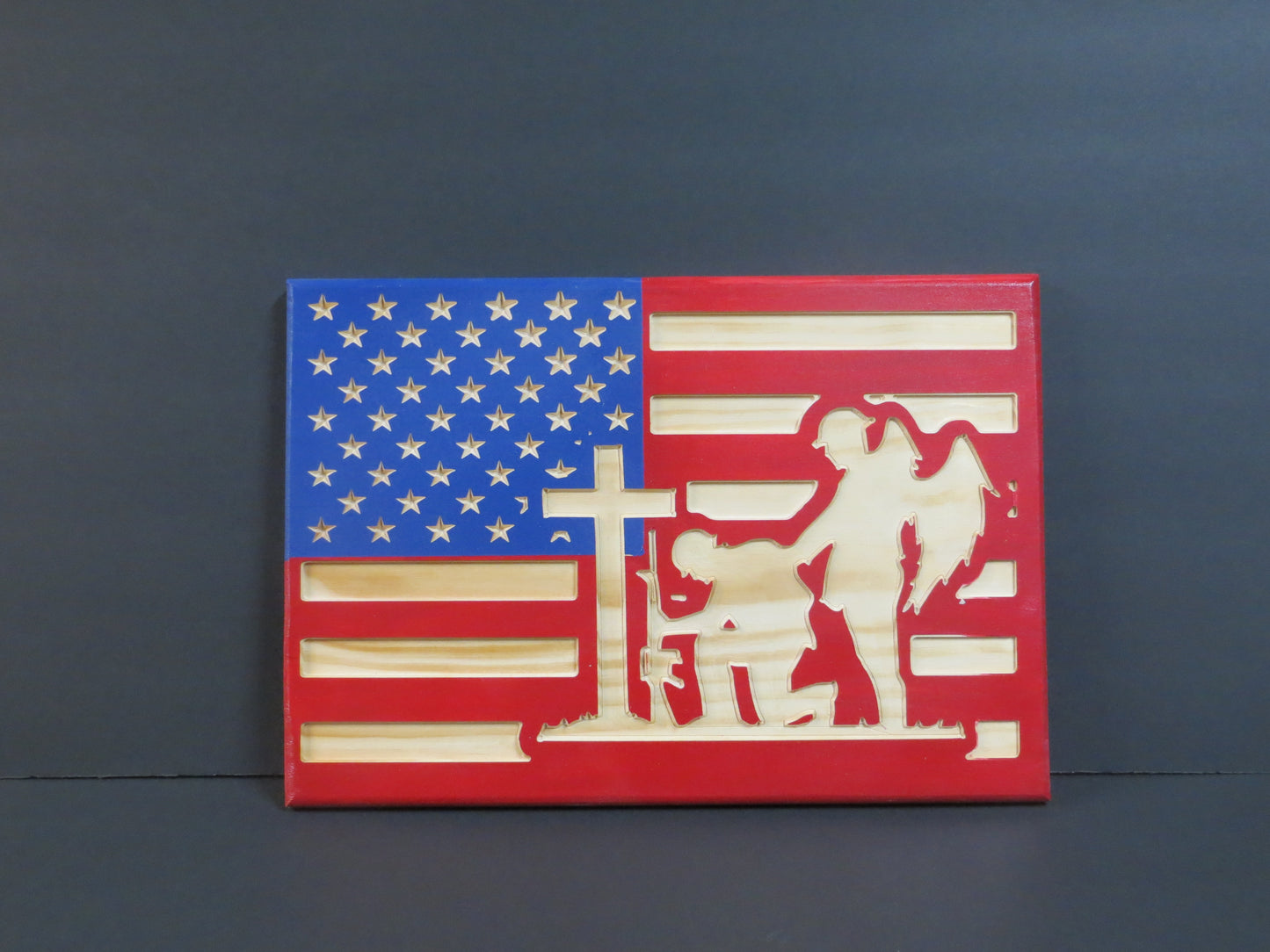 Wooden American Flag with kneeling solider